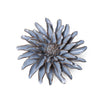 Afbeelding van een keramisch wandobject in de vorm van een blauwgrijze gerbera van het merk Chice Ceramics - SuperMatique