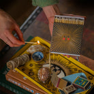 Afbeelding luciferdoosje met golden zon Archivist Gallery - SuperMatique